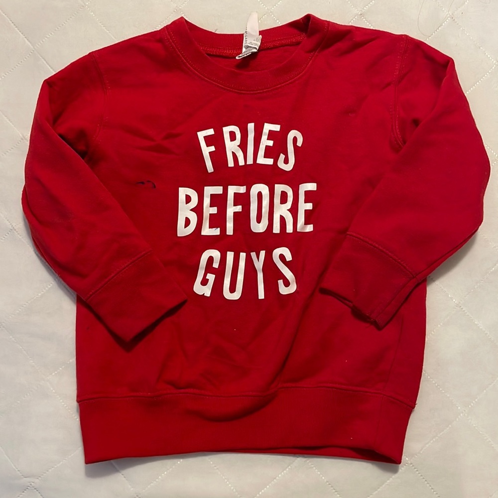 Girls “Fries before guys” sweatshirt. Has small marks on front and right sleeve.